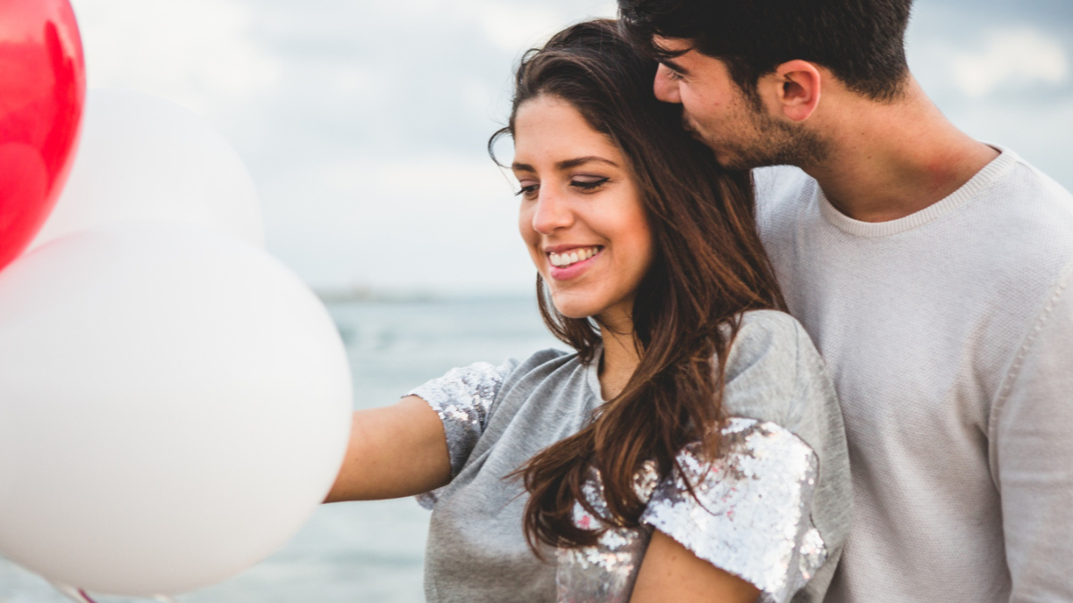 partner giving surprise gift to show appreciation in relationship